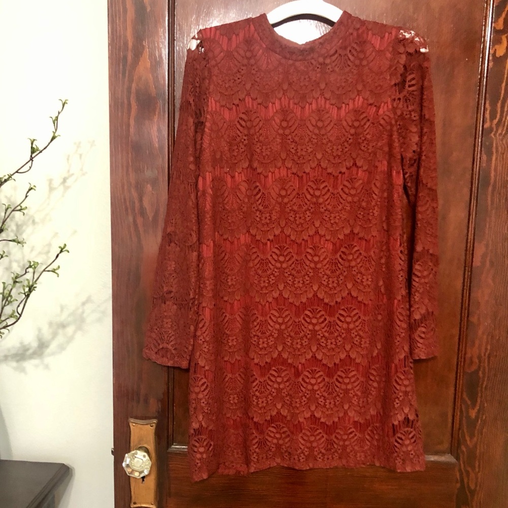Lace pattern burgundy dress.